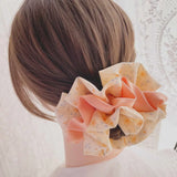 Blossom Ruffle Hair Bow